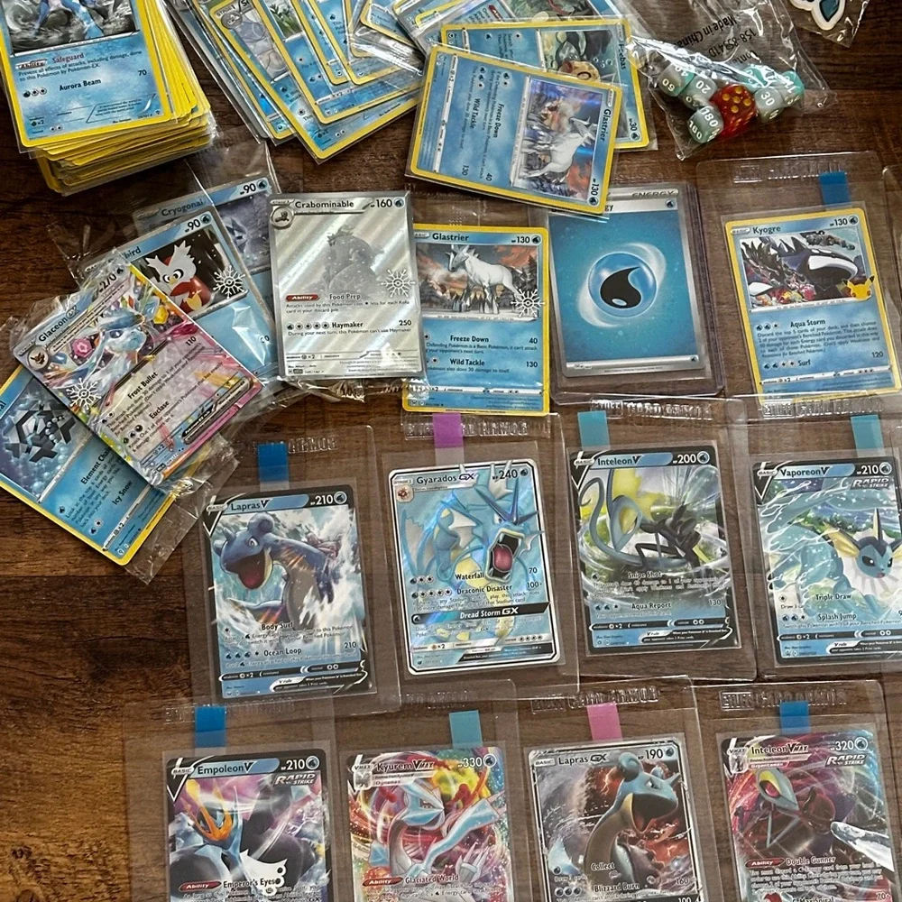 Pokemon Card Collection with Tins and Accessories 25 card Mystery Tin plus bonus